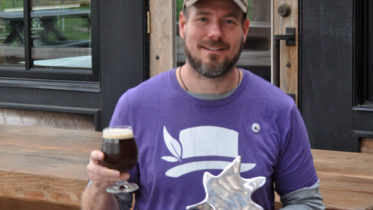 <p>Cheers! – Chris Parsons holds up a pint of his brew to celebrate the          Sustainability Award Parsons Brewing Company won at Friday’s Quinte Business Achievement Awards gala.(Adam Bramburger/Gazette staff)</p>
