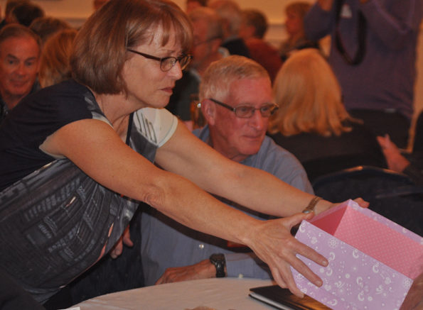 <p>Balloting open – Mary Stever collects votes during Monday’s 100 People Who Care Prince Edward County meeting at the Waring House as Don Farrington looks on. (Adam Bramburger/Gazette staff)</p>
