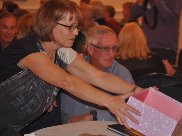 <p>Balloting open – Mary Stever collects votes during Monday’s 100 People Who Care Prince Edward County meeting at the Waring House as Don Farrington looks on. (Adam Bramburger/Gazette staff)</p>
