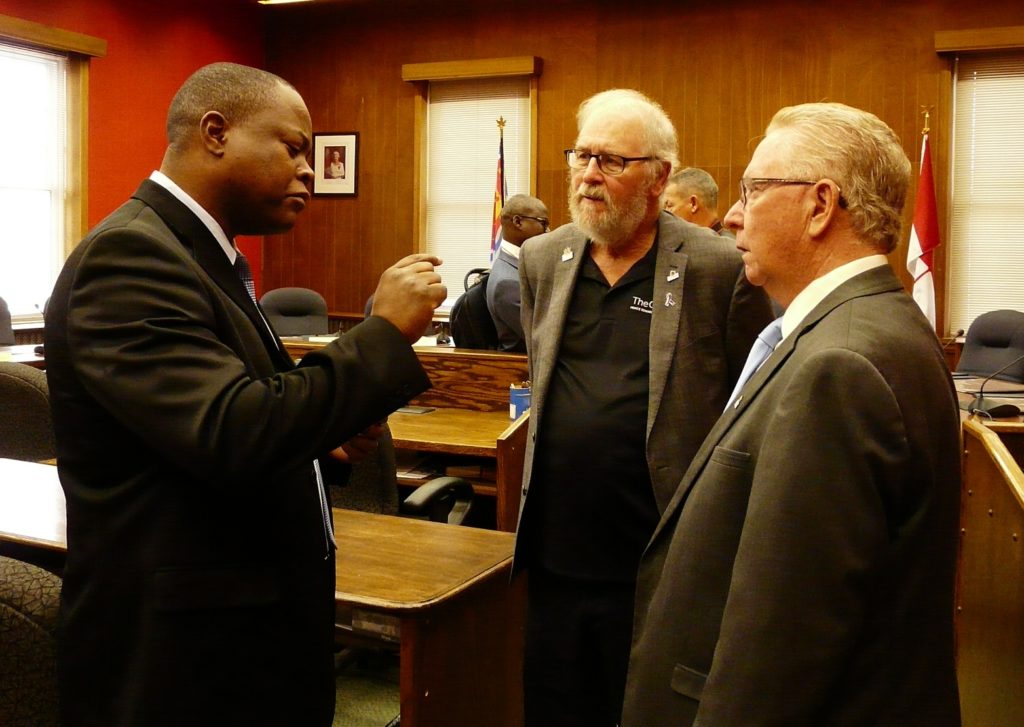 <p>Kouga Local Municipality councillor Bryan Dhludhlu speaks with councillor Gord Fox and Mayor Robert Quaiff on Oct. 23. (submitted photo)</p>
