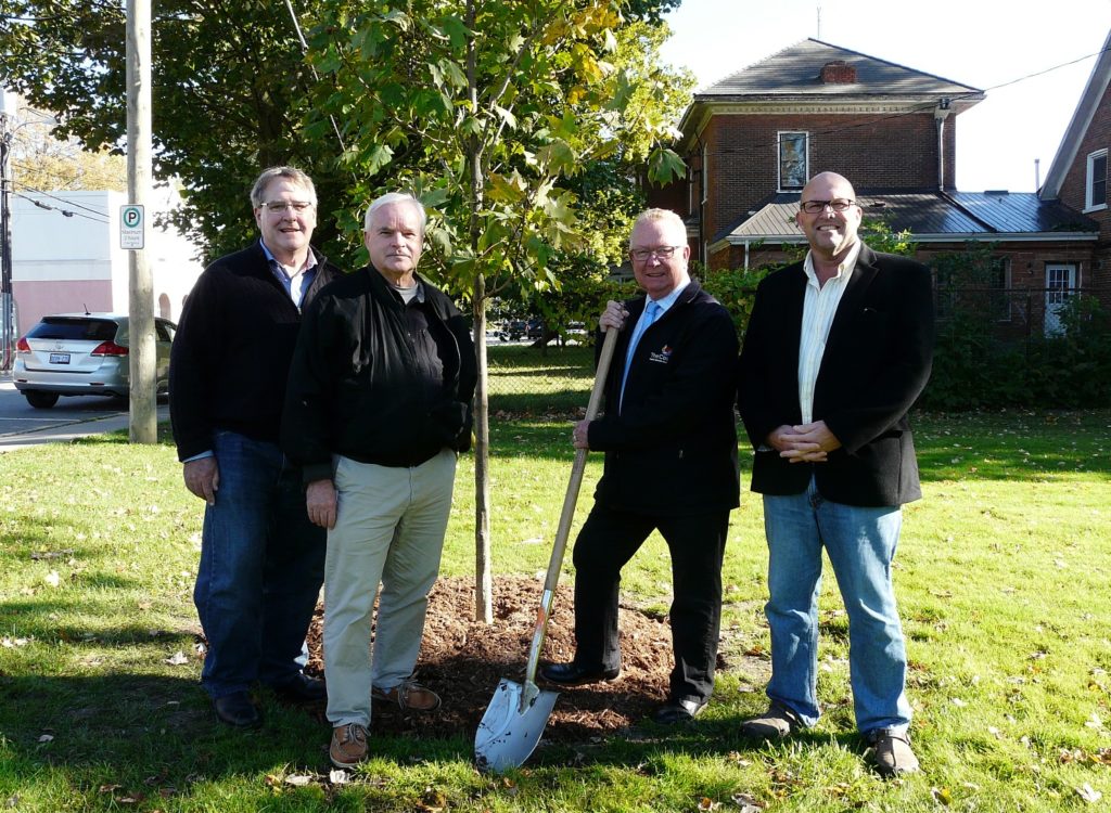 <p>From left, Canada 150 and Prince Edward County 225 Celebration Ad Hoc Committee members Ken Dewar and Peter Lockyer along with Mayor Robert Quaiff and councillor Steve Ferguson were on hand for the planting of the first commemorative tree on Oct. 18.</p>
