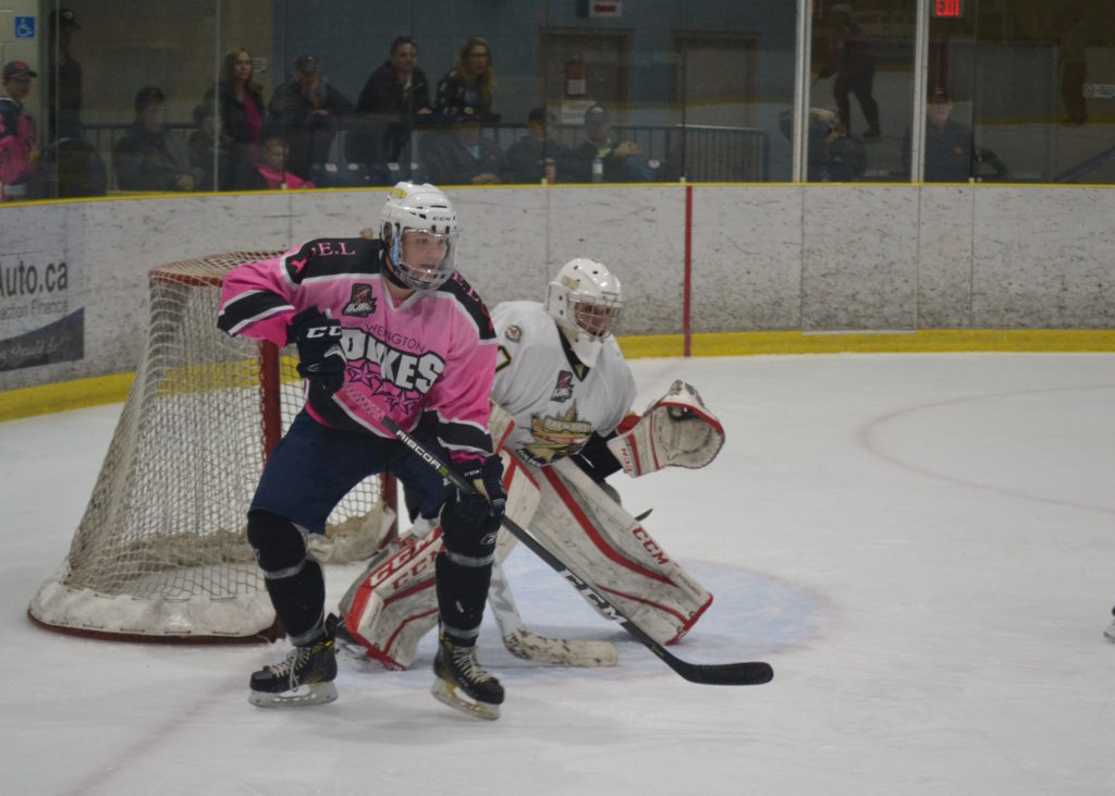 <p>Wellington Duke Ben Evans tries to gain position on Trenton Golden Hawks netminder Will Rawksi during Sunday’s 5-3 loss at Essroc Arena. (Jason Parks/Gazette Staff)</p>
