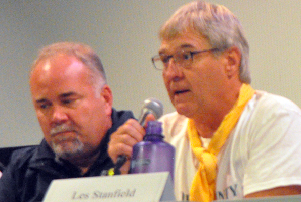 <p>Cracks and crevices – Ecologist Les Stanfield talks about the risks of construction on fractured limestone as Prince Edward-Hastings MPP Todd Smith looks on Sunday. (Adam Bramburger/Gazette staff)</p>
