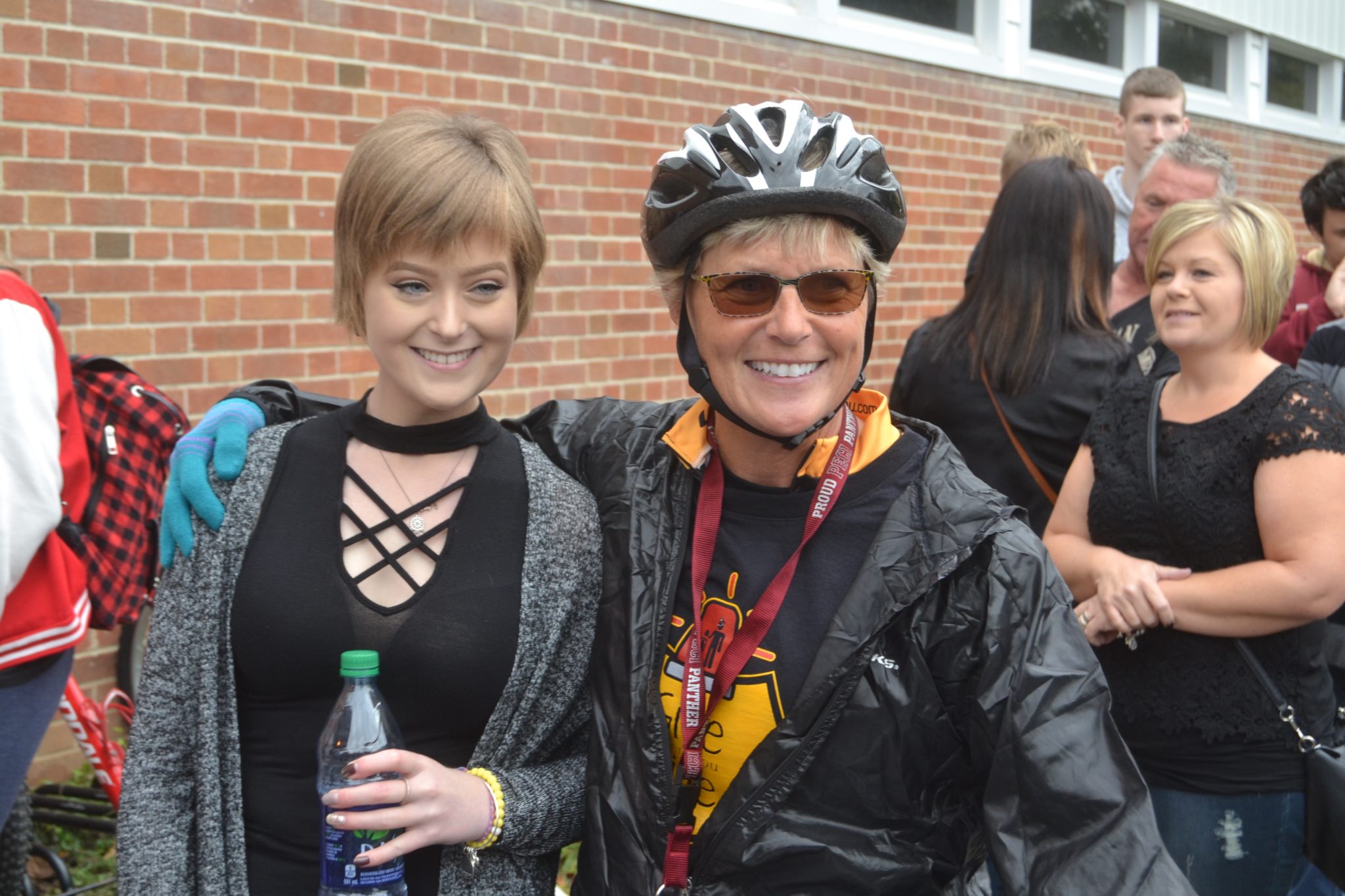 <p>PECI student Abigail Heffernan and Prince Edward OPP Constable Kim Guthrie were all smiles at the ‘Give Where You Live’ stop at the secondary school Wednesday. (Jason Parks/Gazette staff)</p>
