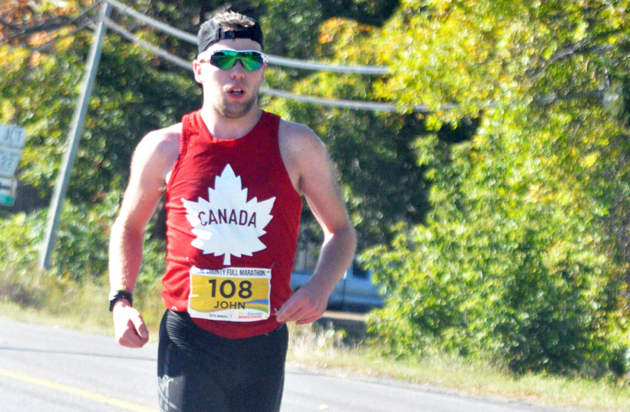 <p>John Bauer, of Hamilton, runs up Lake Street toward the finish of the 14th annual County Marathon. The 23-year-old finished 10 minutes ahead of the second-place runner. (Adam Bramburger/Gazette staff)</p>
