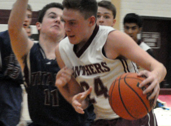 <p>Offensive power – Logan Stark,  pictured here in an exhibition game this fall, has been a key contributor for the PECI Junior Basketball Panthers with 30 points in two games.. (Adam Bramburger/Gazette staff)</p>
