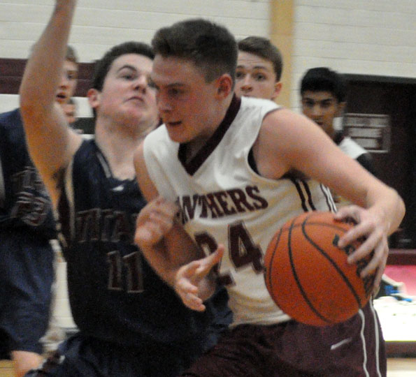 <p>Offensive power – Logan Stark,  pictured here in an exhibition game this fall, has been a key contributor for the PECI Junior Basketball Panthers with 30 points in two games.. (Adam Bramburger/Gazette staff)</p>
