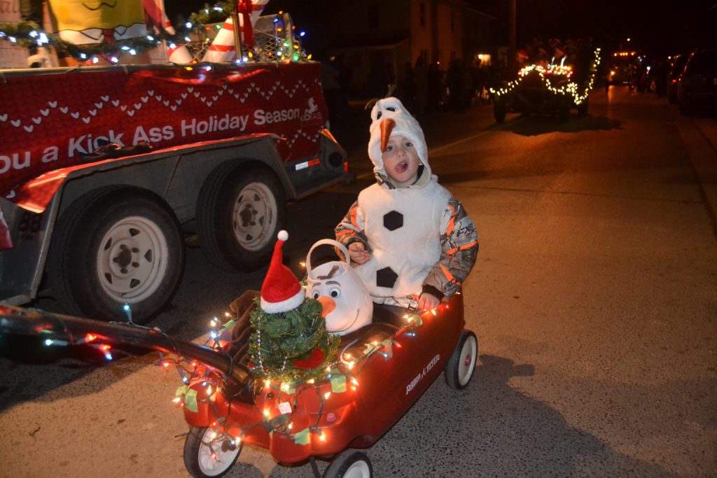<p>NOT SO FROZEN- Even the littlest parade goers didn’t need to worry about frost bite at the 2017 Bloomfield Nighttime Santa Claus Parade presented by  Bloomfield/Hallowell Recreation. For the first time in recent years, the event was held during pleasant conditions. (Jason Parks/Gazette Staff) </p>
