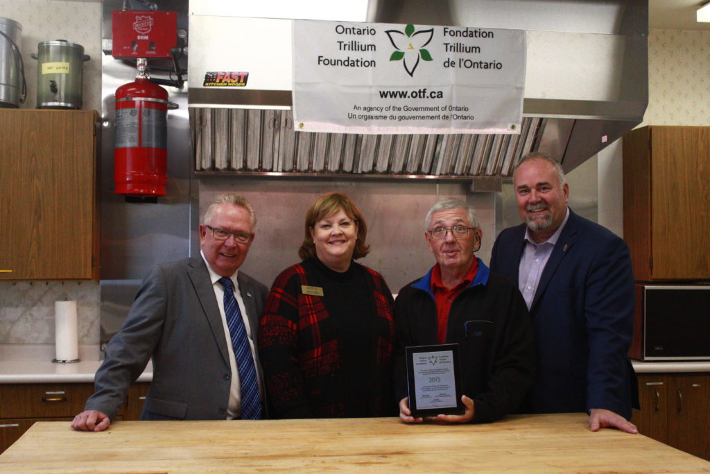 <p>From left, Mayor Robert Quaiff, OTF selection committee member Nancy Parks, curling club member Richard Linnett, and Prince Edward-Hastings MPP Todd Smith celebrate the club’s completion of its range hood project last week. (Chad Ibbotson/Gazette staff)</p>
