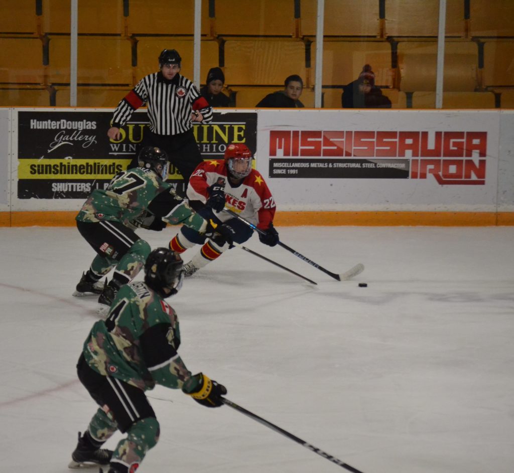 <p>NOWHERE TO RUN- Duke Mitch Martan works his way through the Aurora end of the ice in the first period of Wellington’s 6-1 loss to the host Tigers Saturday night. (Jason Parks/Picton Gazette)</p>
