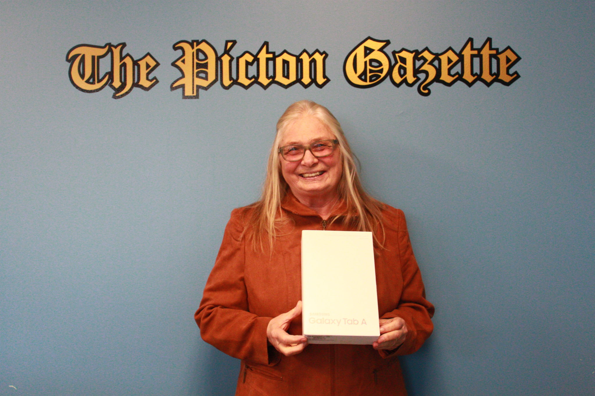 <p>Joan Dumoulin was the lucky winner of a Samsung Galaxy A tablet for following The Picton Gazette on social media and visiting our new web site. (Chad Ibbotson/Gazette staff)</p>
