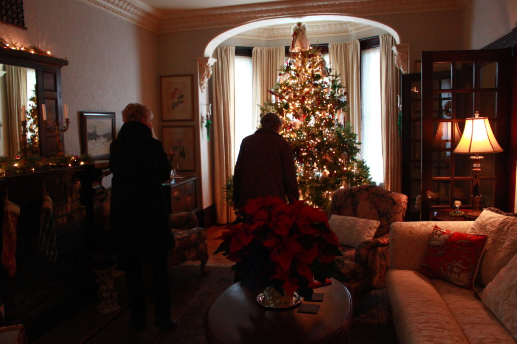 <p>Touring — Visitors explore the historic architecture of Picton’s Babbitt House during the 2015 Christmas in the County House Tour. The house was built by policeman Horatio Babbitt in 1886. (Chad Ibbotson/Gazette staff)</p>
