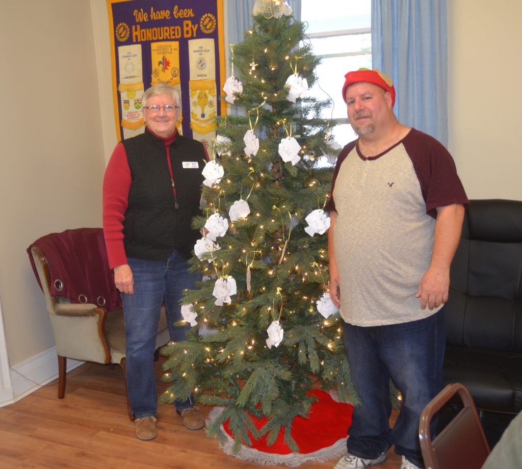 <p>ANGELS AMONG US- Angel Tree campaign organizer Susan Rose and volunteer Scott Whitelock stand aside the Angel Christmas tree at the campaign office Tuesday. The office opened Monday at Benson Hall and the tree was adorned with nearly two dozen angels by Tuesday afternoon. (Jason Parks/Gazette staff)</p>
