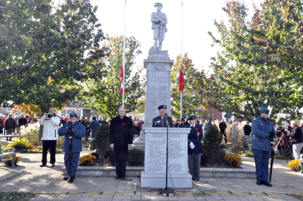 <p>Picton’s Cenotaph during the 2017 Remembrance Day ceremonies. Names from the memorial are being used to name new streets and roadways. (Adam Bramburger/Gazette file photo)</p>
