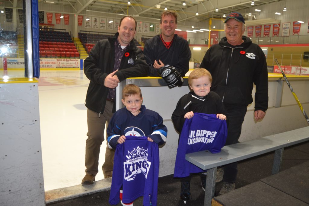 <p>BIG ASSIST- Prince Edward County Minor Hockey Association Pre-School players (from left) Jackson Easterbrook and Chase Douglas will be looking sharp for the rest of the season thanks to a donation of new sweaters by (Right) Ralph Douglas of Lil’ Dipper Excavating. Also pictured are (Standing, from left) PECMHA President Darren Marshall and program coordinator Darren Yuill. (Jason Parks/Picton Gazette)</p>
