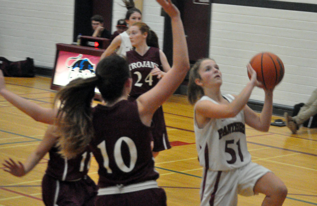 <p>Scoring chance – Panthers guard Hannah Goad takes her best shot as a pack of Moira Trojans defend Thursday. (Adam Bramburger/Gazette staff)</p>
