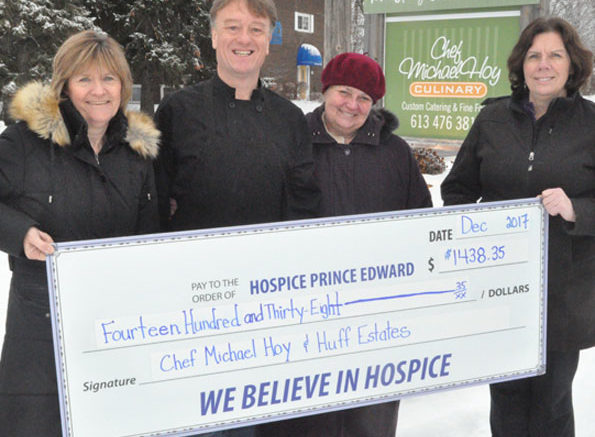 <p>Food for food – Hospice Prince Edward residential manager Deb MacDonald (left) and executive director Karen Moore (right) receive a donation of $1,438.35 from Michael and Susan Hoy Friday following a series of fundraising dinners last month. (Adam Bramburger/Gazette staff)</p>
