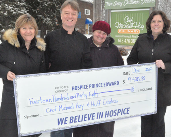 <p>Food for food – Hospice Prince Edward residential manager Deb MacDonald (left) and executive director Karen Moore (right) receive a donation of $1,438.35 from Michael and Susan Hoy Friday following a series of fundraising dinners last month. (Adam Bramburger/Gazette staff)</p>
