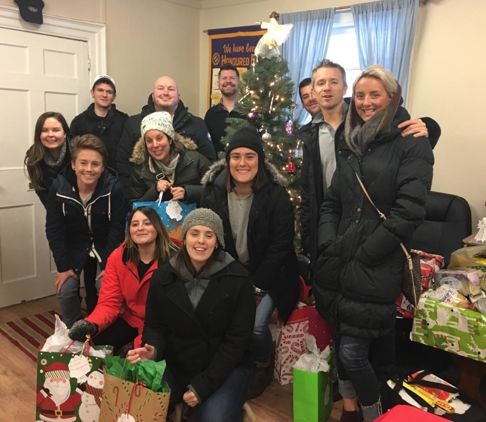 <p>KICKING IT- Staff Members of KA Media of Bloomfield deliver gifts for the Angels they selected form the Angel Tree earlier this holiday season. (Submitted Photo)</p>
