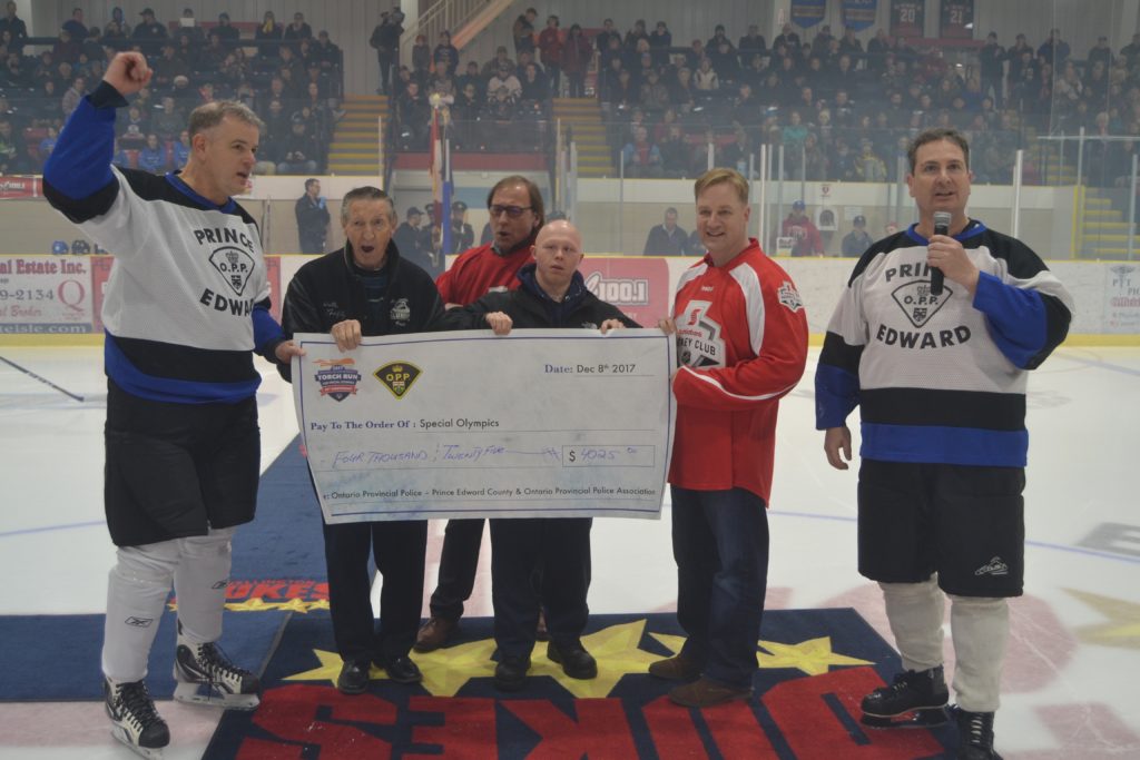 <p>GREAT SUPPORT- (RIGHT) Prince Edward OPP Staff Sergeant John Hatch thanks the crowd assembled at the Essroc Centre Friday night and announced the benefit game raised $4,025 in support of Special Olympics Ontario. (Jason Parks/Gazette Staff)</p>
