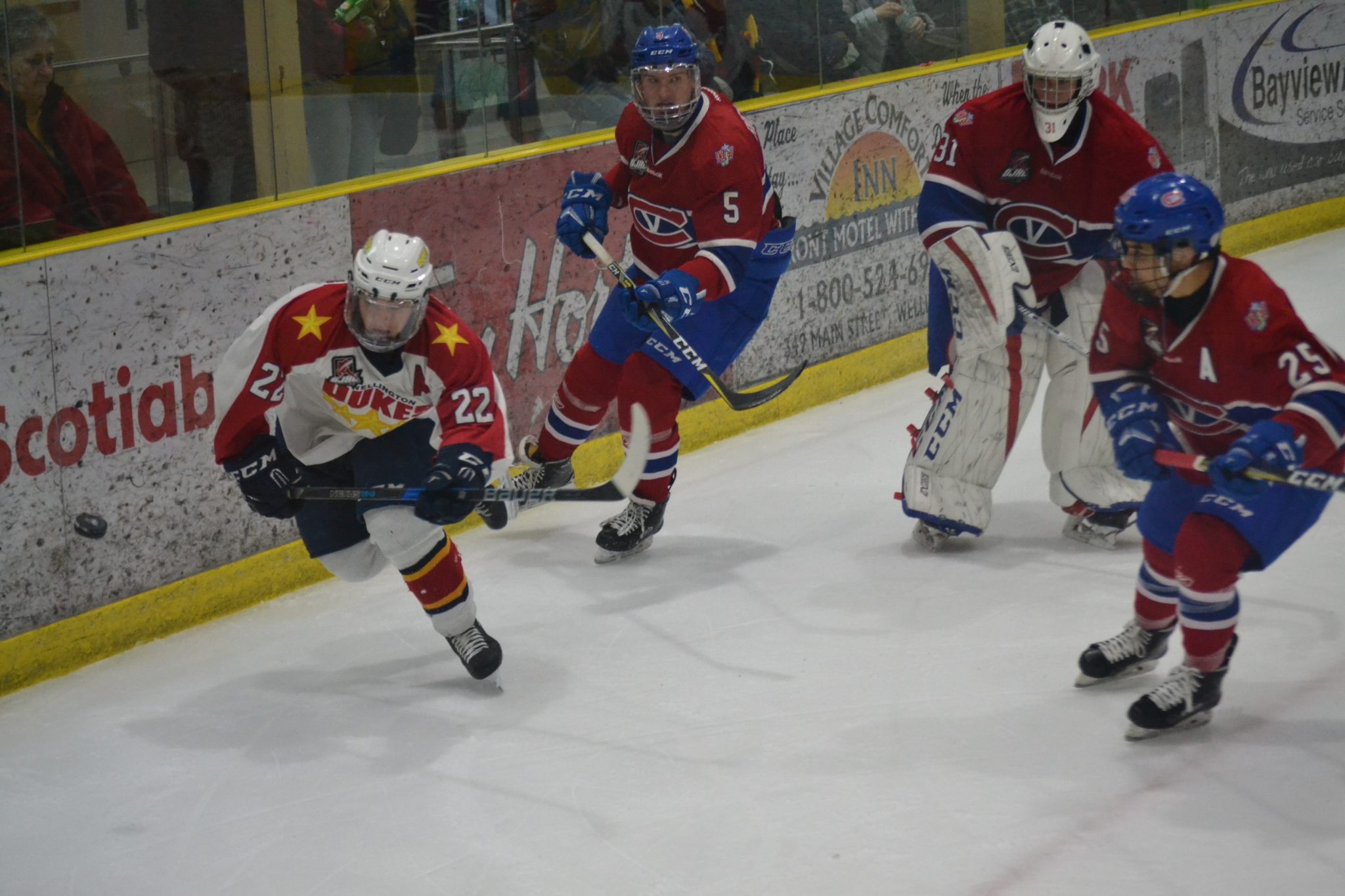 <p>IN THE THICK OF IT- Wellington Duke Mitch Martan tries to wrangle an errant puck while being watched by a trio of Kingston Voyageurs. Wellington took down the Vees 4-2 in a spirited affair. (Jason Parks/Gazette Staff)</p>
