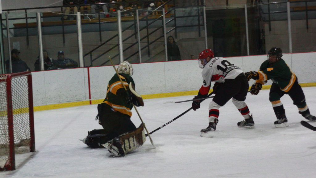 <p>Pirates forward Jordon Cannons makes a backhand move on Amherstview Jets goaltender Keegan Paulette during the first period of a Jan. 4 game. (Chad Ibbotson/Gazette file photo)</p>
