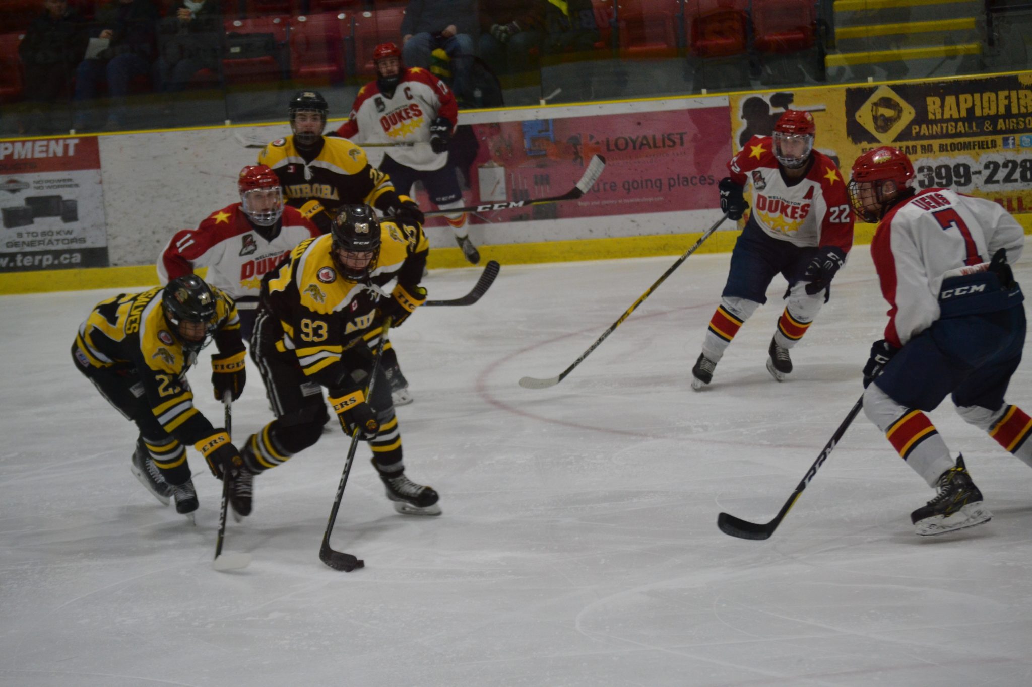 <p>IN CONTROL- Aurora Tiger forward Anthony Romano fires a puck to the Wellington net as Dukes defenceman Zach Uens tries to make a block at Essroc Arena Friday evening. Wellington lost to the visiting Tigers 4-3. (Alana Pickrell for the Gazette)</p>
