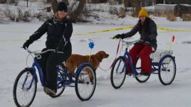 <p>Pedalling on the pond -Bicycle rides and other games on the Milford millpond were a tradition at the winter carnival.. (Jason Parks/Gazette staff)</p>
