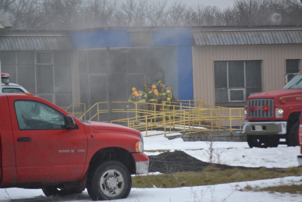 <p>SMOKE SCREEN- Prince Edward County Fire Fighters head into a fire at a former elementary school at Macaulay Village just outside of Picton on Monday afternoon (Jason Parks/Gazette Staff)</p>
