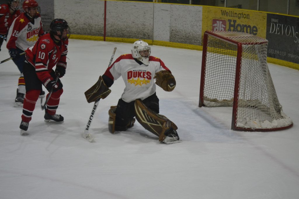 <p>BACKSTOPPED- Dukes netminder Tyler Richardson kicks away one of 24 pucks sent his way during Wellington’s 5-0 win over visiting Stoufville Sunday. It was Richardson’s first start on Essroc Arena ice since being acquired from the Lindsay Muskies earlier this month. (Jason Parks/Gazette Staff)</p>
