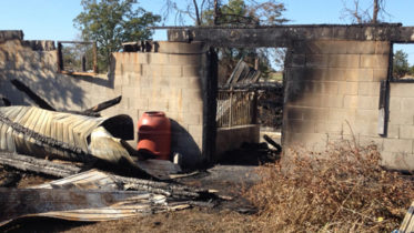 <p>Demolished – A burnt cinder block foundation is all that remained after a suspicious fire razed a barn on County Rd. 13 in October. The fire was one of several suspicious blazes with similar circumstances leading to an arson investigation. (Jason Parks/Staff)</p>
