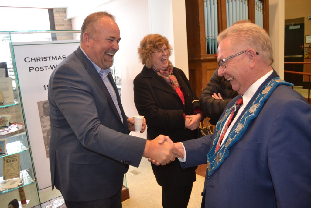 <p>SO FAR, SO GOOD- Prince Edward-Hastings MPP Todd Smith and Prince Edward County Mayor Robert Quaiff share a laugh at the 2018 New Year’s Levee at Macaulay Museum Sunday. Quaiff, a Liberal nominee in the upcoming provincial election, said he is in the race to win a seat at the Ontario Legislature. (Jason Parks/Gazette Staff)</p>
