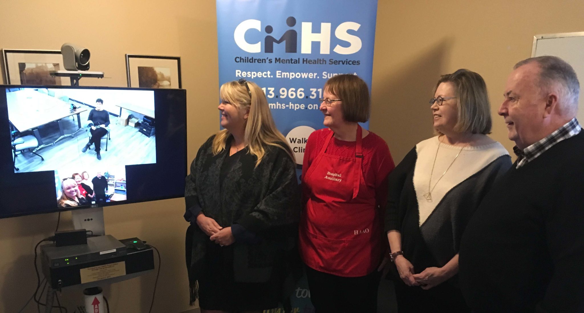 <p>Connected &#8211; Children&#8217;s Mental Health Services Hastings and Prince Edward executive director Susan Sweetman (left) and secretary/treasurer Kate Brookfield (second from right) show off their new Ontario Telemedicine Network portal to Prince Edward Memorial Hospital Auxiliary president Pat Evans and secretary Andre Gratton Friday.  (Adam Bramburger/Gazette staff)</p>
