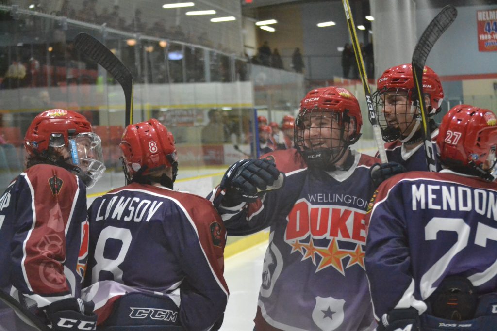 <p>ALL SMILES- (Centre) Wellington Dukes Captain Colin Doyle was happy with Geoff Lawson’s game tying goal early in the second period of Wellington’s 5-4 overtime win over the visiting Trenton Golden Hawks. (Jason Parks/Gazette Staff)</p>
