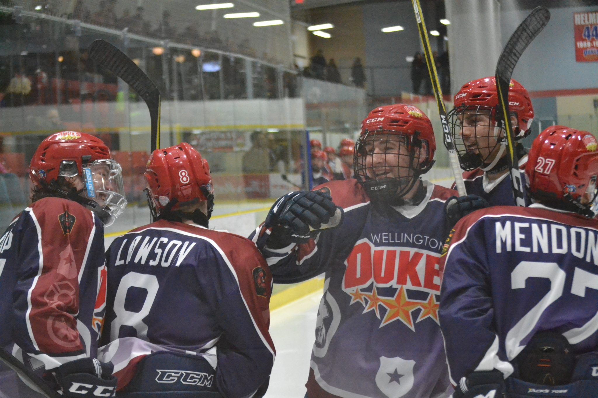 <p>ALL SMILES- (Centre) Wellington Dukes Captain Colin Doyle was happy with Geoff Lawson&#8217;s game tying goal early in the second period of Wellington&#8217;s 5-4 overtime win over the visiting Trenton Golden Hawks. (Jason Parks/Gazette Staff)</p>
