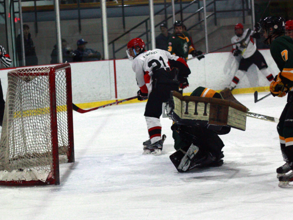 <p>Pirates forward Jaydon Wood beats Jets goaltender Keegan Paulette with a backhand move. (Chad Ibbotson/Gazette staff)</p>
