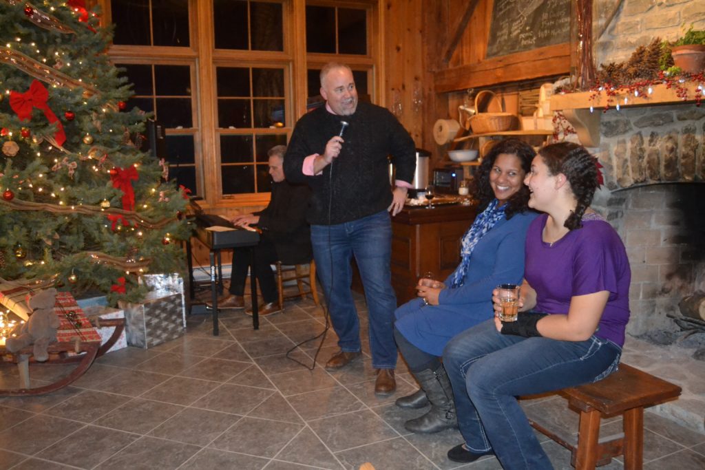 <p>SING ALONG- Prince Edward Hastings MPP Todd Smith croons ‘White Christmas’ to his wife Tawnya and daughter Reagan at the Grange Winery late last month. The MPP hosted his annual levee at the Prince Edward County winery. (Jason Parks/Picton Gazette)</p>
