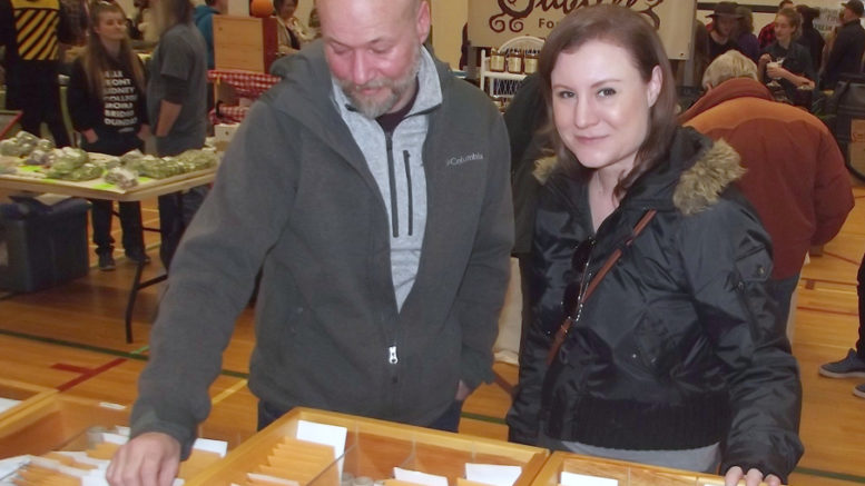 <p>selecting seeds Jason Pedracini, of Cannifton, and Jennifer Wickman, of Toronto, checked out the varieties available at the Terra Edibles booth during Seedy Saturday at PECI last weekend. (Terry McNamee/For The Gazette)</p>
