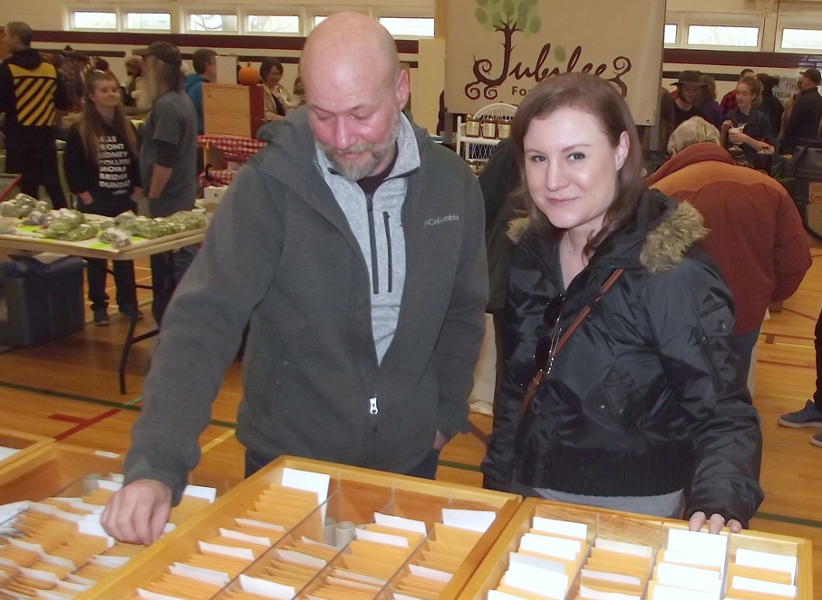 <p>selecting seeds Jason Pedracini, of Cannifton, and Jennifer Wickman, of Toronto, checked out the varieties available at the Terra Edibles booth during Seedy Saturday at PECI last weekend. (Terry McNamee/For The Gazette)</p>

