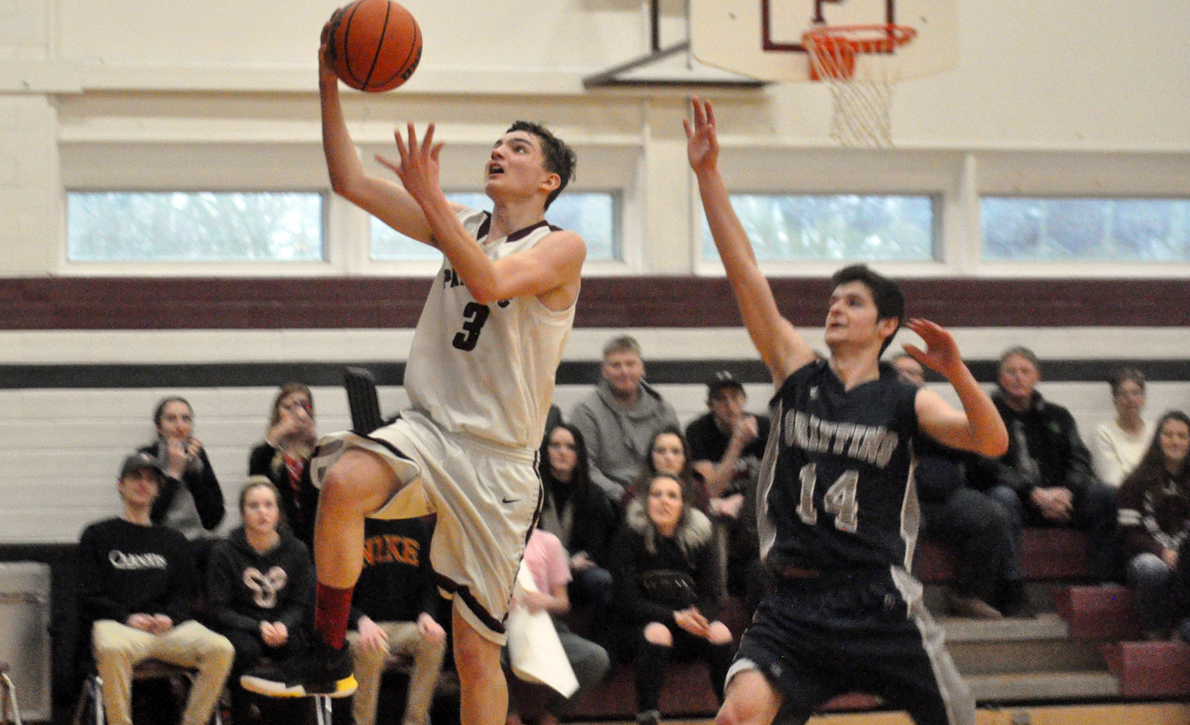 <p>Taking flight – PECI Senior Panther John McHugh concentrates on scoring a layup as Thomas A. Stewart’s Jake Hadzi defends. (Adam Bramburger/Gazette staff)</p>
