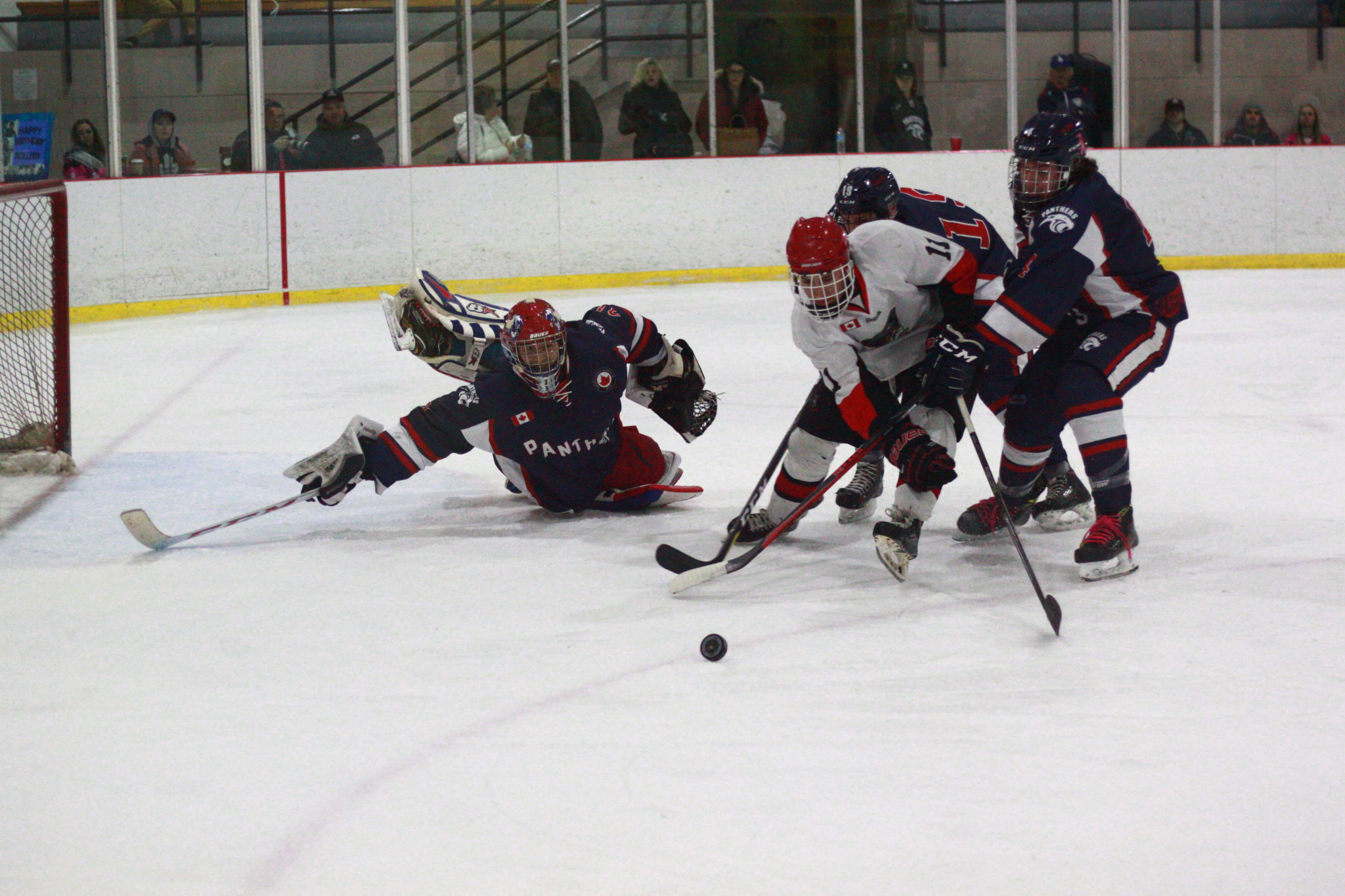 <p>Pirates forward Trey Maracle attempts a move around Port Hope goaltender Sheldon Calbury with Nathan Snoek and Christian Streef in pursuit. (Chad Ibbotson/Gazette staff)</p>
