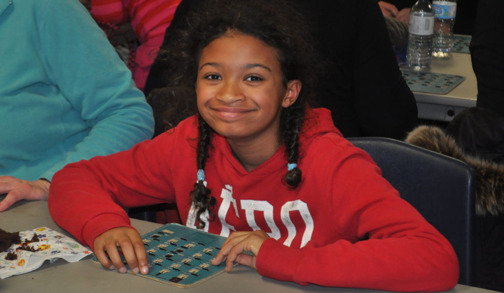 <p>Bingo! – Kate Jones enjoys filling her card at a past South Marysburgh family bingo event at the Milford Town hall. (Adam Bramburger/Gazette staff)</p>
