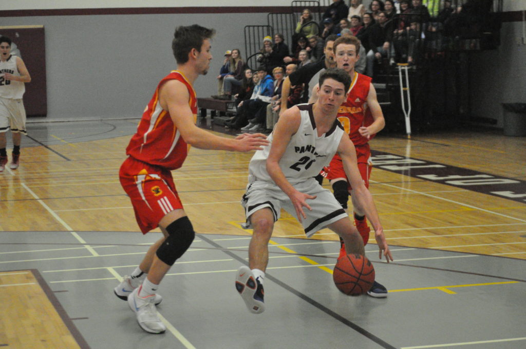 <p>Drive to the hoop – PECI Panther Wyatt Gilbert works to get in position for a layup against Sydenham at Moira Friday. (Adam Bramburger/Gazette staff)</p>
