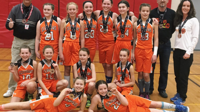 <p>Silver squad – The Under-12 County Clippers took second place at the Ontario Cup.  Pictured are (back row, left to right) Coach Bill Latchford, Sydney Stark, Lily Anderson, Brooke Gallagher, Jada Ashley, Maeve Sanderson, Brooke Spencer, assistant coach Phil Bender,  manager Laurie Spencer.  (Front row, from left) Charlotte DenOuden, Olivia McFaul, Lainey VanVlack, Maya Latchford-Kulker, Isabella Bender, Drew Spencer. (Jason Parks/Gazette staff)</p>
