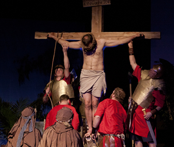 <p>Sacrifice – Actors portray a scene of soldiers removing Jesus Christ from the cross as part of a dramatic re-enactment of the Easter story at Emmanuel Baptist Church in Bloomfield. (Submitted photo)</p>
