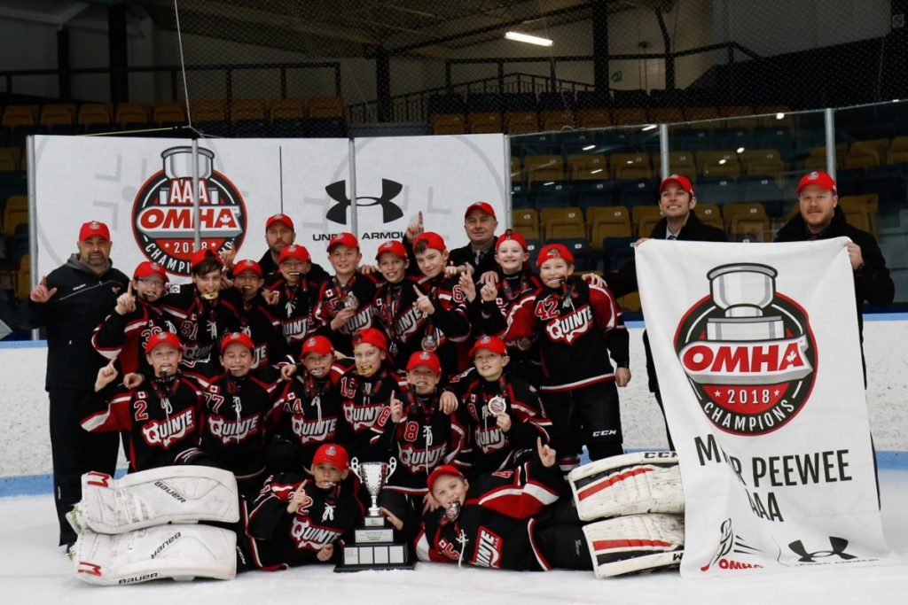 <p>ALL ONTARIO- The 2018 OMHA AAA Minor Pee Wee Champions. County natives Brody Partridge (44) and Liam Philip (18) are at centre of photo kneeling above the Thomas Hyde Memorial Trophy. (Photo courtesy Quinte Red Devils)</p>
