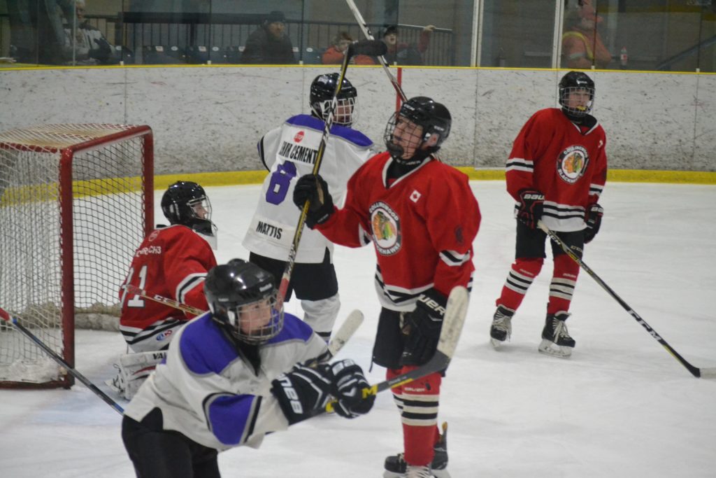 <p>THE THRILL OF VICTORY…- Ross Maycock celebrates his third period goal while a dejected Collingwood Blackhawk looks on. The Kings and Hawks play Game 6 of their OMHA Semi-Final series tonight in Wellington.(Jason Parks/Gazette Staff)</p>
