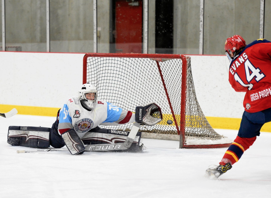 <p>GETTING IN FRONT- Wellington Duke Ben Evans puts a puck past Pickering Panther Ethan Langevin in the first period of Game Two at the Pickering Recreation Complex Sunday night. (Shawn Muir/OJHL Images)</p>
