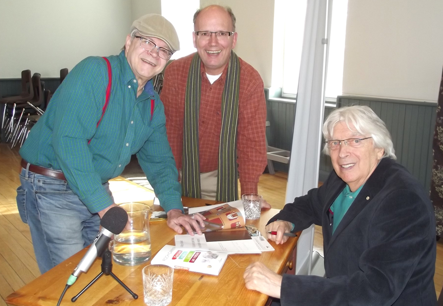 <p>A lasting memory – Edward Hildreth (left) and Reg Zima of Picton were thrilled to have author Roch Carrier sign a copy of one of his books following a talk by Carrier at the Picton Town Hall on Friday, April 2. Carrier’s children’s book about a Montreal hockey fan receiving a Toronto sweater is well known. (Terry McNamee/For The Gazette)</p>
