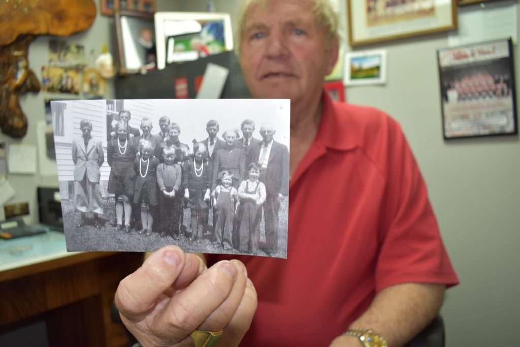 <p>EARLY BEGINNINGS- Ben Prinzen shows a family photo taken in the spring of 1948 just days after the group arrived from Holland. Prinzen, aged 7 at the time, is centre with hands folded. (Jason Parks/Gazette Staff)</p>
